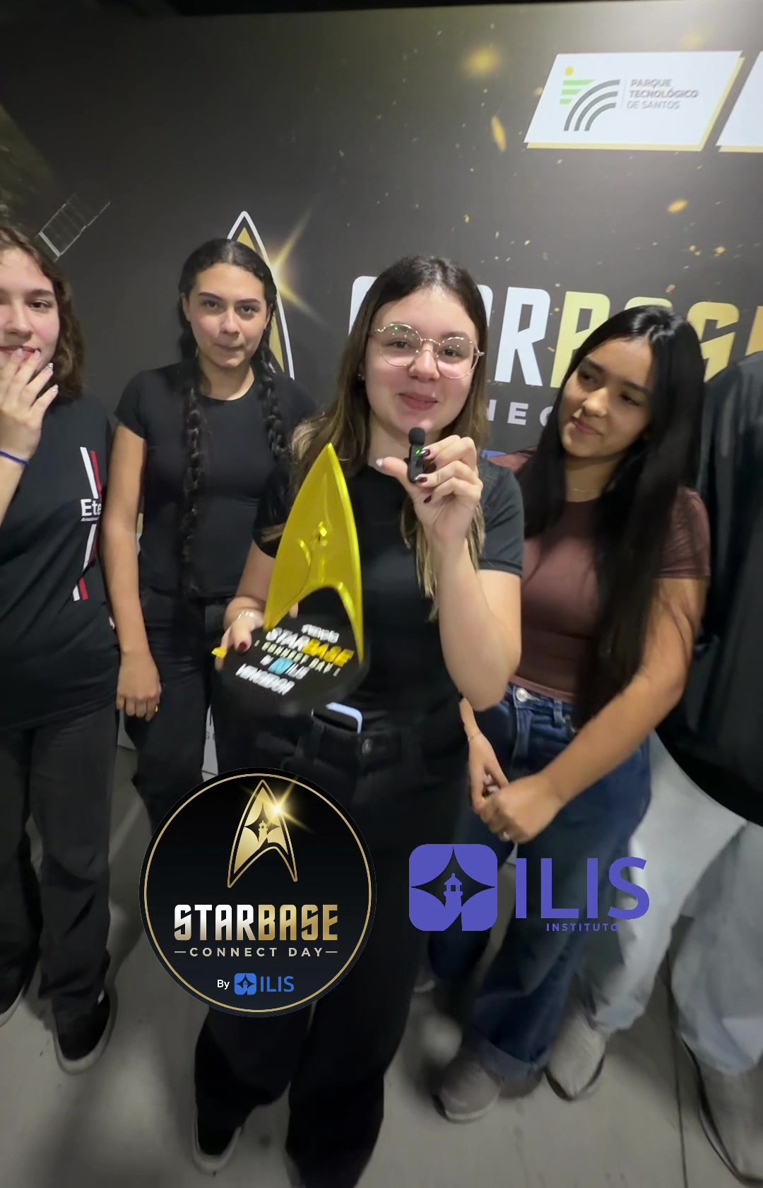 StarBase Connect Day winners pose in front of the event backdrop.